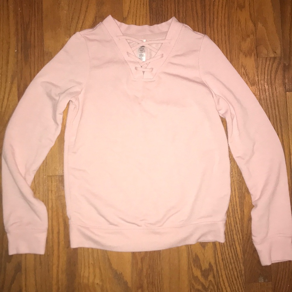 A pink long sleeved shirt